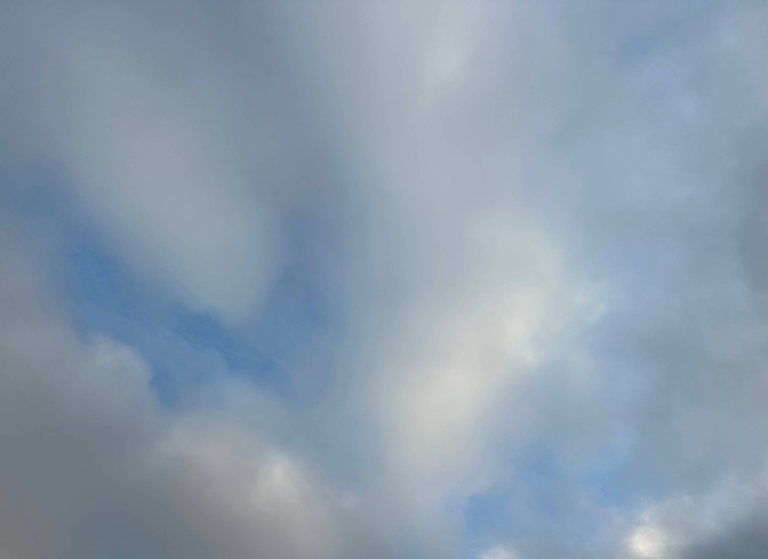 clouds and a light blue sky overhead